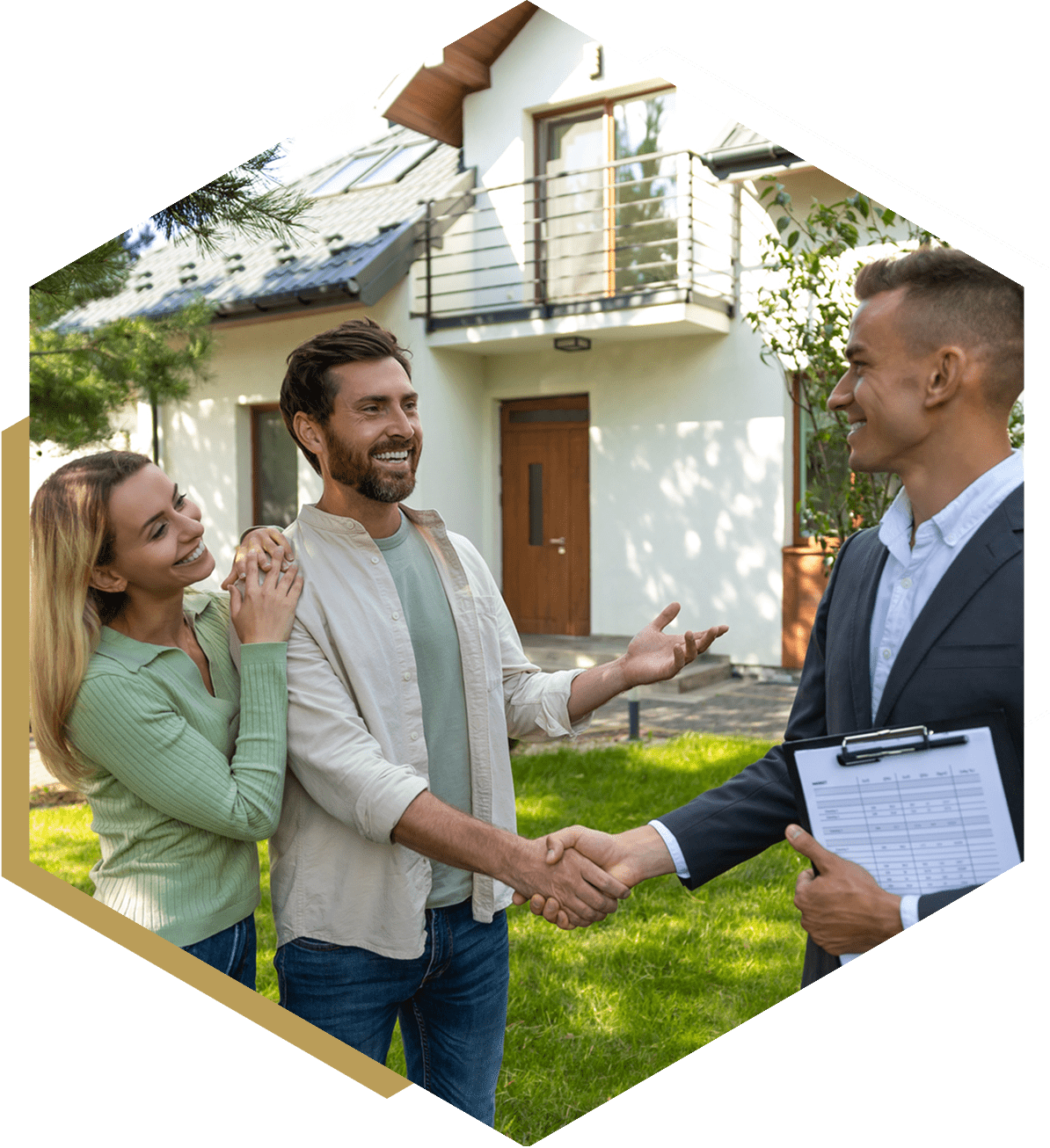 Couple shaking hands with real estate agent.